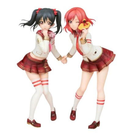 Three pink strawberries in a line